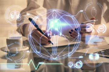 Double exposure of education theme sketch hologram and woman holding and using a mobile device.