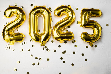 golden foil balloon number 2025. New Year two thousand twenty fifth and golden numbers. 20 and 25...
