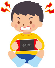 携帯ゲームで遊ぶ男の子　イライラ