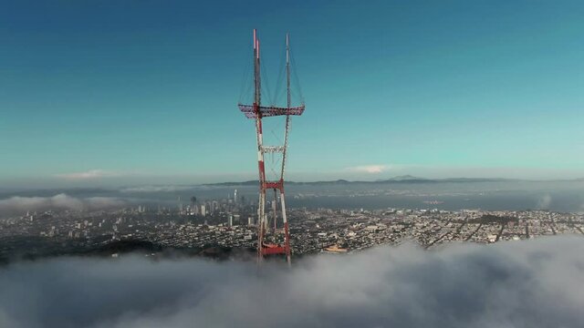 Aerial: Sutro Tower and foggy skyline. San Francisco, USA