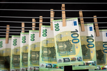 Euro notes on clothesline. Money laundering on clothesline. Money Laundering euro hung out to dry....