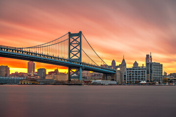 Philadelphia, Pennsylvania, USA skyline on the Delaware river with Ben Franklin Bridge