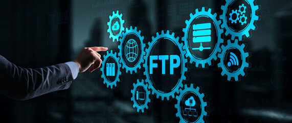 Businessman Hand touching FTP inscription. Mixed Media Technology concept