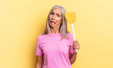 feeling puzzled and confused, with a dumb, stunned expression looking at something unexpected and...