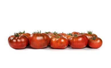 Many Heirloom tomatoes, front view.  Unusual stunning group of fresh, dark red to burgundy 