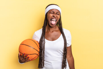 with cheerful, carefree, rebellious attitude, joking and sticking tongue out, having fun. basket...