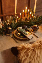 Christmas Table Setting and Holiday Night Decorations.