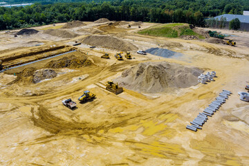 Aerial view at work preparing ground construction in new residential building