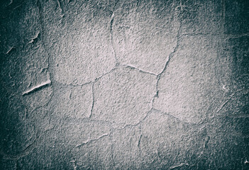 Cracked, bumpy wall texture background