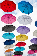 Fototapeta na wymiar set of colorful umbrellas sky