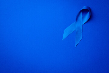 Blue prostate ribbon. Awareness of men health in November with blue prostate cancer ribbon isolated...