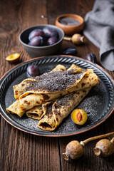 Lokse, traditional Slovak potato flatbread with plum jam and poppy seed filling