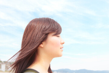 Profile of young woman with eyes closed