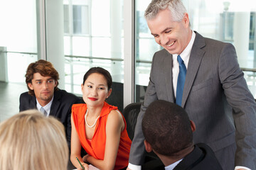 Business team holding meeting in office