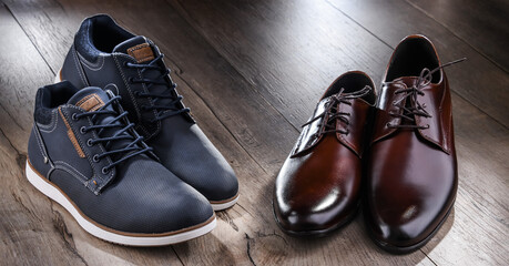 Composition with two pairs of men's shoes