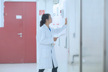 Scientist in control room