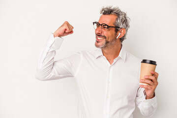 Middle age business man holding a take away coffee isolated on white background  raising fist after a victory, winner concept.
