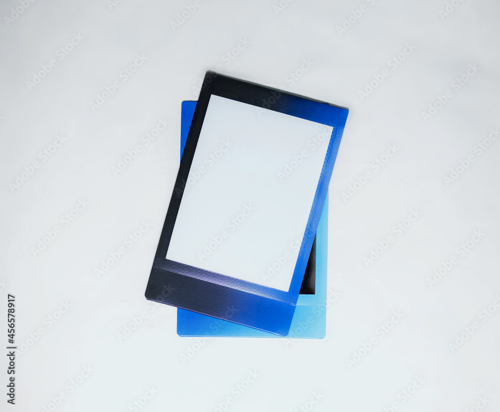Fototapete two blank instax photo frame on white background as template for graphic design. photo cards with sp