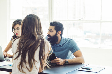 Business people in brainstorming meeting