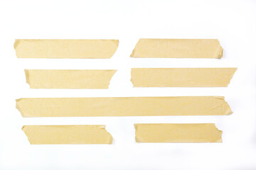 Adhesive tape pieces in line on white background, with cliping path