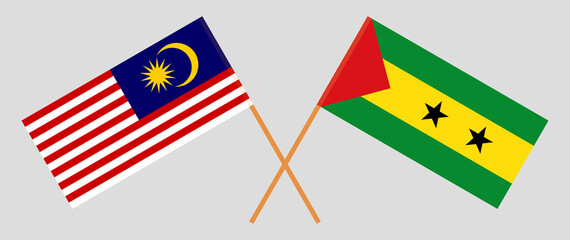 Crossed flags of Malaysia and Sao Tome and Principe. Official colors. Correct proportion