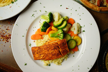grilled fish with vegetables overhead
