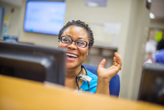 Hospital staff at reception desk in hospital