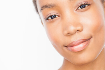 Obraz premium Cropped close up of woman looking at camera smiling