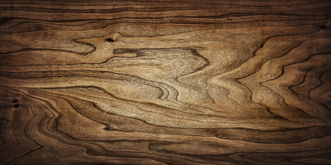 Wooden walnut background, texture of an old tree. Walnut texture close up.