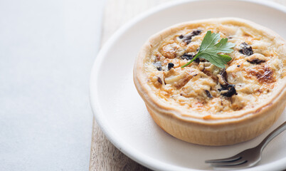 quiche with mushrooms and chicken, french pie, selective focus, copy space