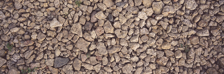 Panoramic view of broken stone pattern at construction site of rail road