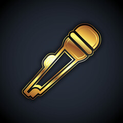 Gold Microphone icon isolated on black background. On air radio mic microphone. Speaker sign. Vector