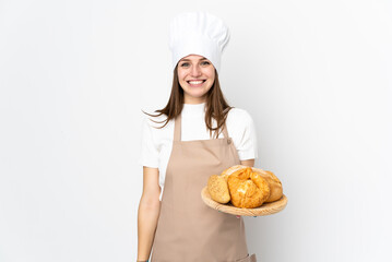 Young woman in chef uniform isolated on white background applauding