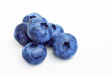 Handful of blueberries on white background