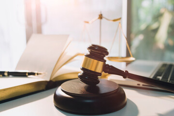 Business and lawyers discussing contract papers with brass scale on desk in office. Law, legal...