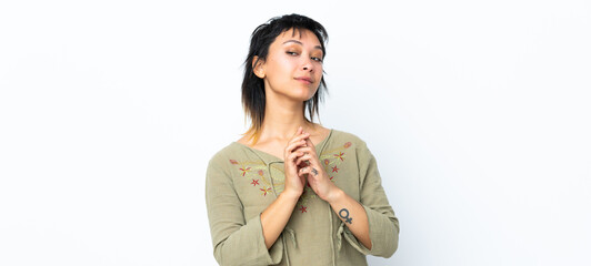 Young Uruguayan girl over isolated white background scheming something