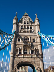 Fototapeta na wymiar London Tower Bridge over Thames river, detail of the towers