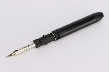 Electric soldering iron for mounting electronic components.