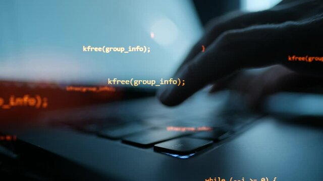 Close up hand of developing programming and coding technologies. Programmer hand typing on keyboard. Put on the wood table at night. Programmer concepts.