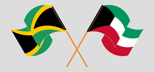 Crossed and waving flags of Jamaica and Kuwait