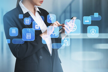 Businesswoman wearing formal suit is holding smartphone with dig