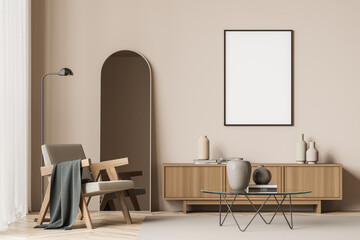 Empty canvas on wall of beige seating area with armchair
