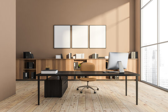 Beige panoramic office with three empty white canvas