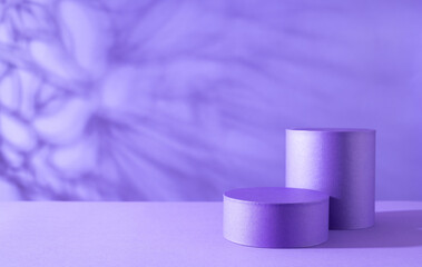 Halloween holiday concept. Podiums or pedestals for products display on purple background.