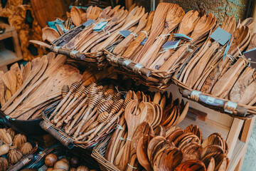 Products made from olive tree, wooden souvenirs on sale in Greece island - Corfu. Local market with...