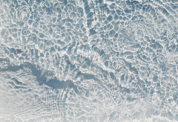 The bubbling of clear, transparent water