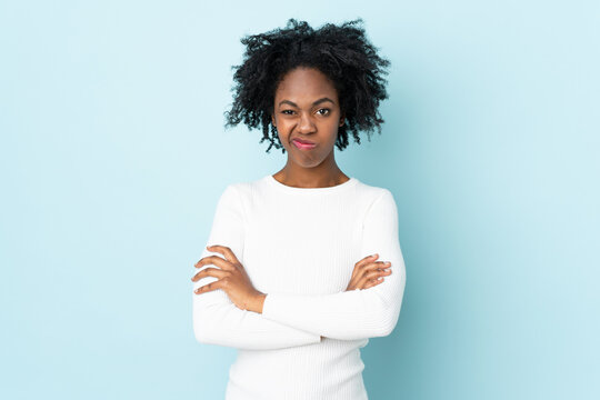 Young African American woman isolated on blue background feeling upset