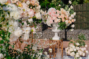 details. the wedding ceremony in the open air of fresh flowers, with candles