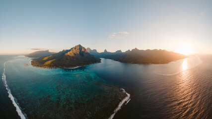 Moorea Tahiti French Polynesia Island Aerial Sunset Ocean Mountains beach  - obrazy, fototapety, plakaty