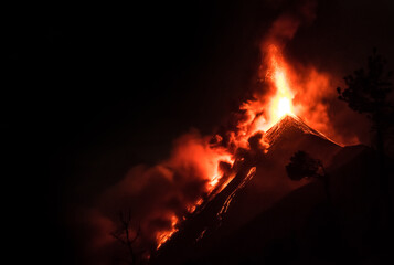Fototapeta na wymiar Volcano Eruption Orange Lava Explosion Guatemala at night